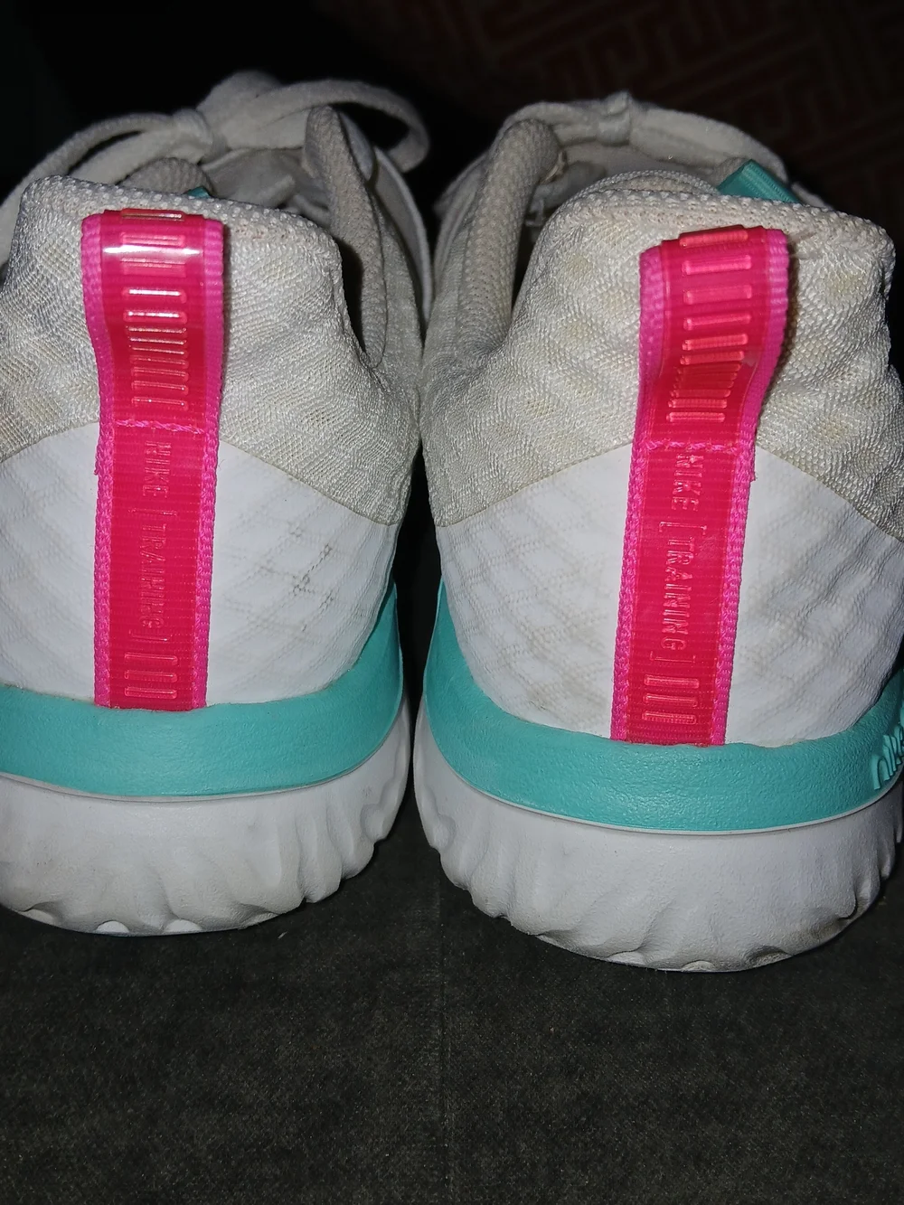 Nike Women’s White Athletic Sneakers with Pink Accents